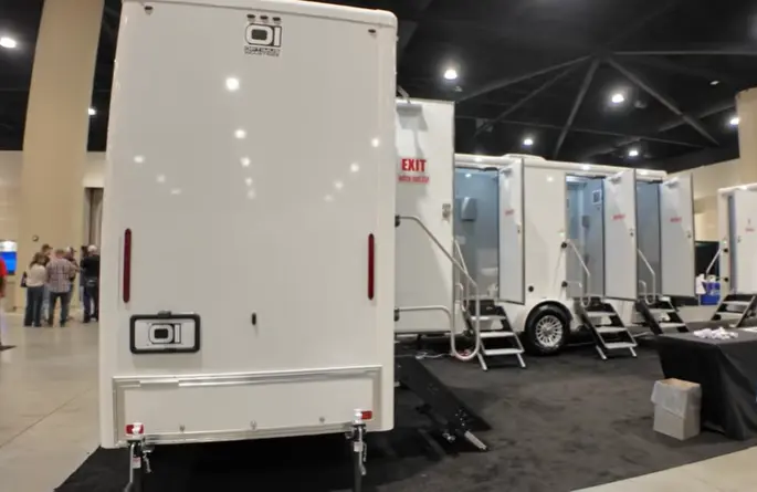 Portable toilet rental positioned for a Richmond construction crew